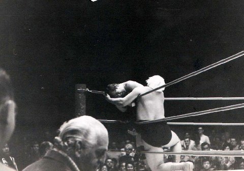 Collins slams Francis into the corner