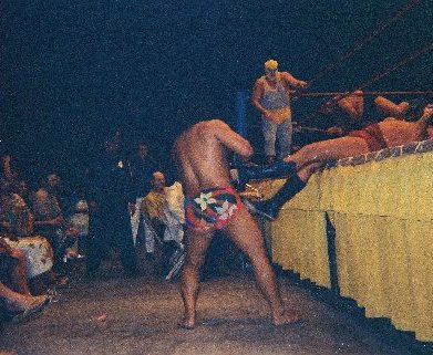 Peter Maivia drags Johnny Barend out of the ring
