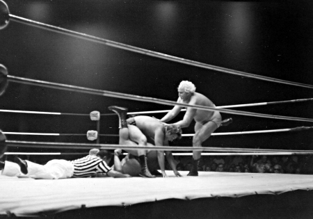 Luke Graham tries to prevent Nick Bockwinkel.
